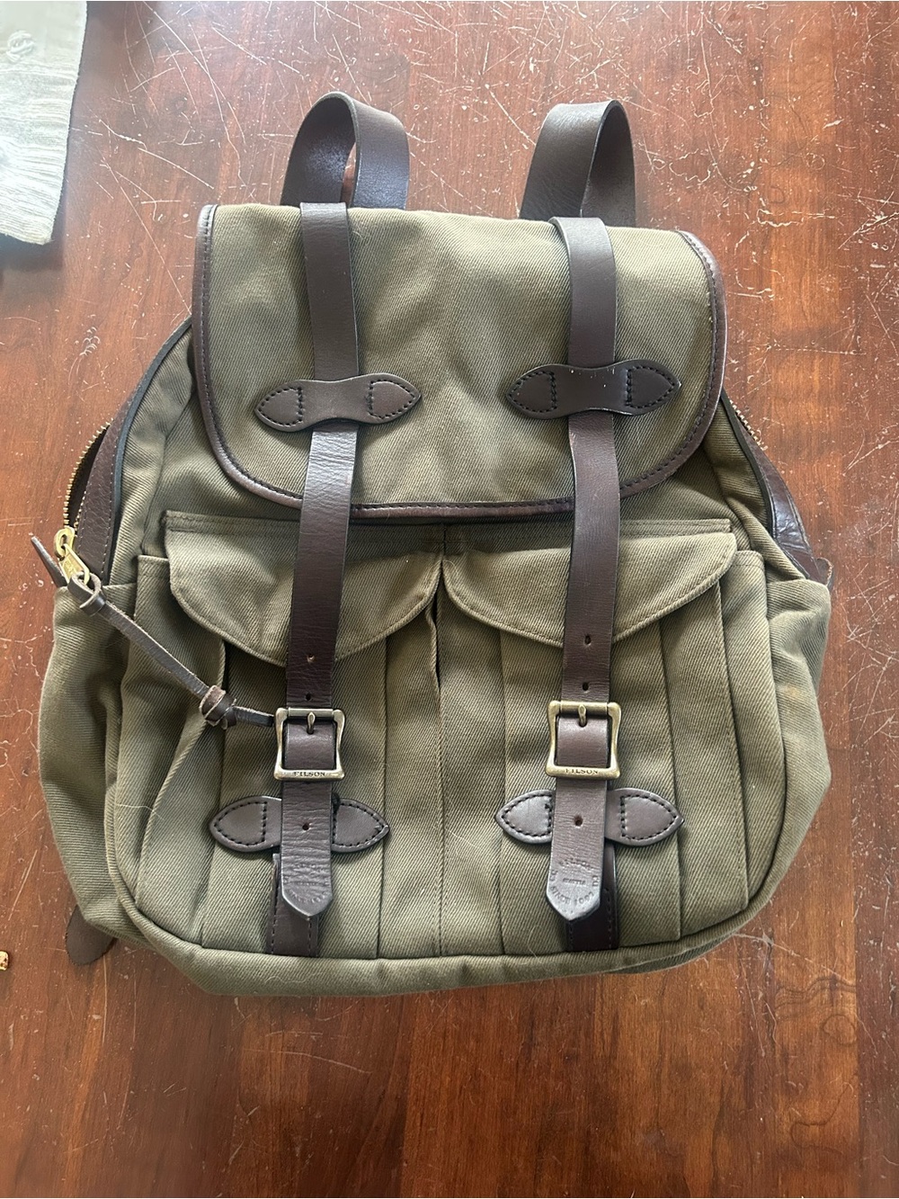 Filson Olive Green Canvas Backpack with Brown Leather Trim